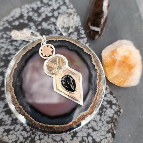 From the Darkness Necklace- Rutile Quartz, Onyx, & Mixed metal