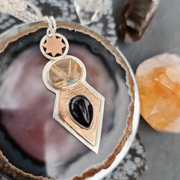 From the Darkness Necklace- Rutile Quartz, Onyx, & Mixed metal